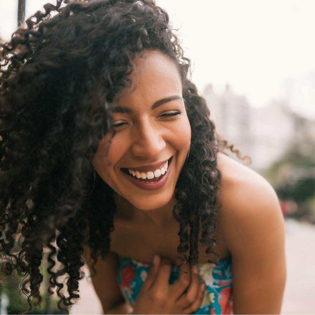Young woman laughing